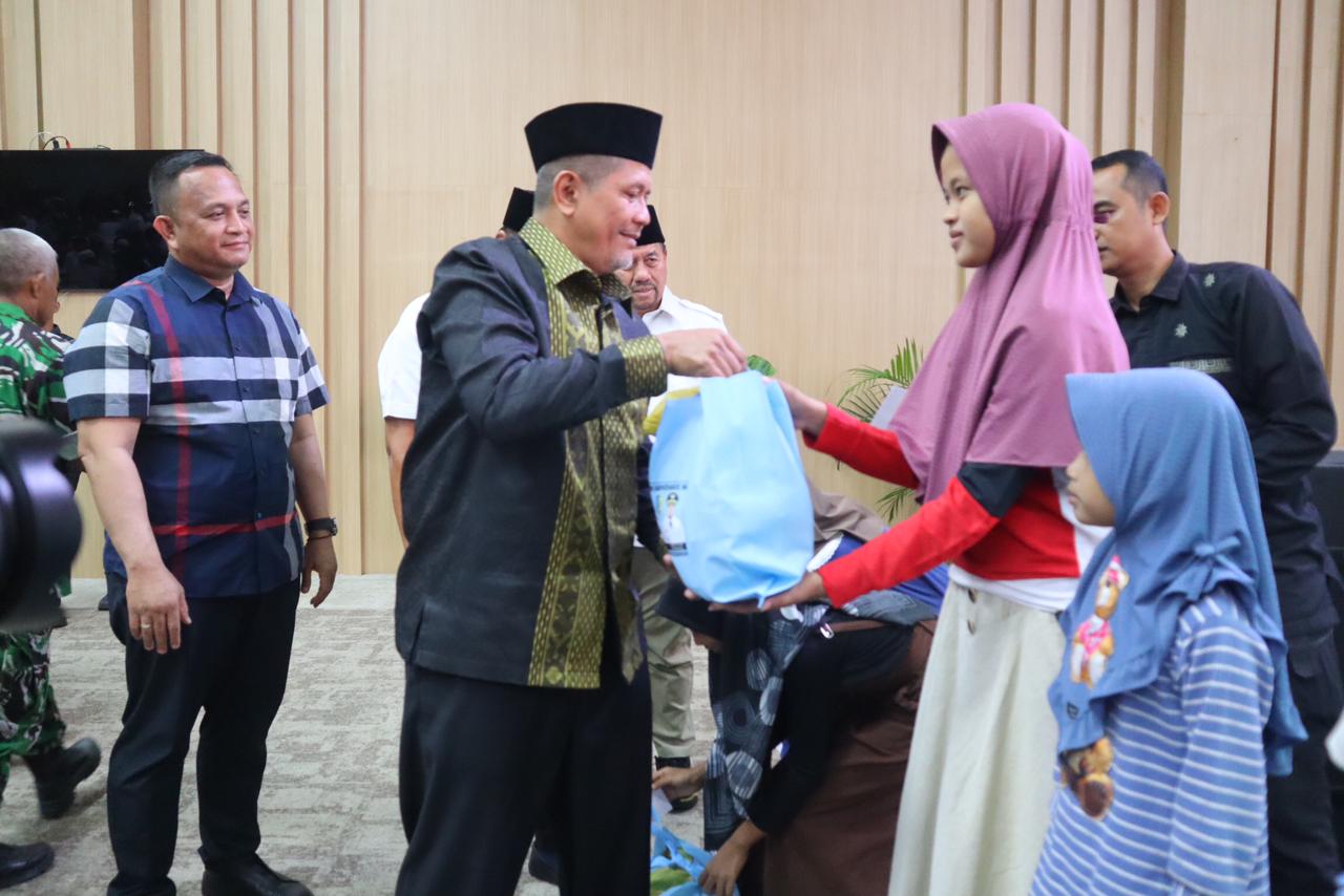 Kapolres Batu Bara Hadiri Buka Puasa Bersama Pemerintah Kabupaten, Serahkan Santunan Kepada Anak Yatim