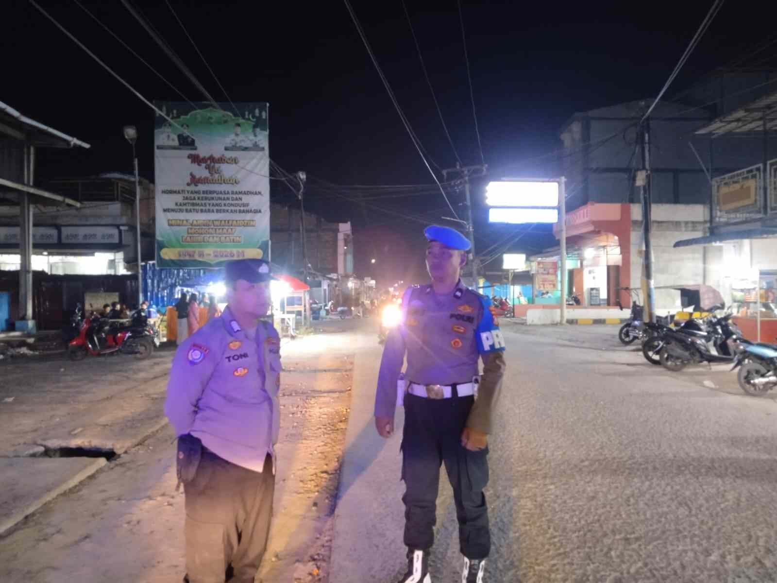 Polsek Talawi Laksanakan Patroli Mobile Malam Hari – Antisipasi Kejahatan dan Himbau Anti Pungutan Liar di Tanjung Tiram