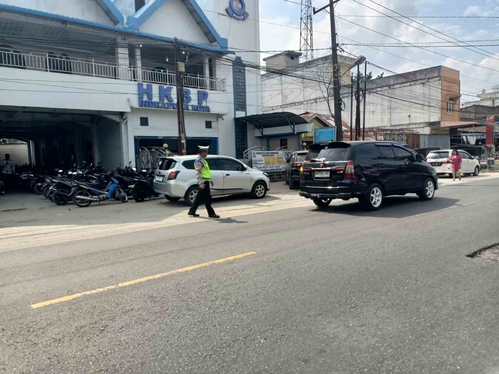 Satlantas Polres Batu Bara Lakukan Pengamanan Gereja di Minggu Raya – Kegiatan Aman Lancar